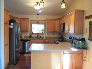 Photo for 3801 Riverton Avenue, Eagan, MN 55122 - Listing #6116062 Updated kitchen boasts loads of solid surface counter and cupboard space, with pantry, and newer stainless steel appliances.