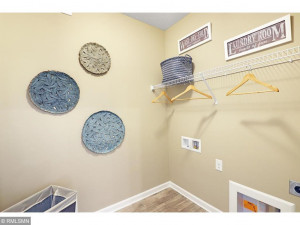Photo for 373 Freedom Lane, Delano, MN 55328 - Listing #6127482 One floor living means main floor laundry! Model photo, colors and selections may vary.