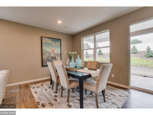 Photo for 373 Freedom Lane, Delano, MN 55328 - Listing #6127482 The home's dining area has enough space to accommodate just about any dining table! Photo of model, colors will vary
