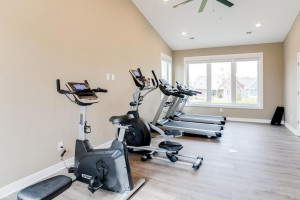 Photo for 19386 Grass Lake Trail, Rogers, MN 55374 - Listing #6128845 Clubhouse fitness center includes cardio machines, bench and dumbbells. Everything you need for a great workout!