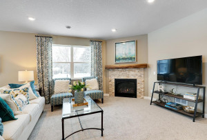 Photo for 19386 Grass Lake Trail, Rogers, MN 55374 - Listing #6128845 Family Room with Beautiful Fireplace. Photos are of model home. Colors may vary.