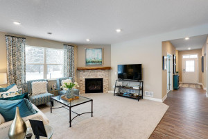 Photo for 19386 Grass Lake Trail, Rogers, MN 55374 - Listing #6128845 Open Concept Family Room. Photos are of model home. Colors may vary.