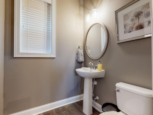 Photo for 7294 Bunker Lake Boulevard NW, Ramsey, MN 55303 - Listing #6123436 Photo of a different home with similar floorplan. Finishes and options may vary. Half bath privately located off the mudroom room area.