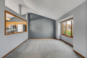 Photo for 14371 Salem Avenue, Savage, MN 55378 - Listing #6127088 The wall between the kitchen and living room is open, allowing light to flow into both rooms.