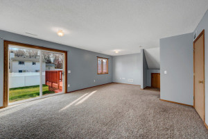 Photo for 14371 Salem Avenue, Savage, MN 55378 - Listing #6127088 Lower level family room with slider to back yard.