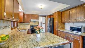 Photo for 2024 Eaglewood Circle, Shakopee, MN 55379 - Listing #6129537 Kitchen view from granite peninsula looking into front entry hallway
