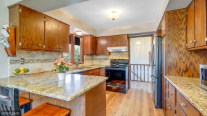 Photo for 2024 Eaglewood Circle, Shakopee, MN 55379 - Listing #6129537 Kitchen view from dining area - beautiful granite countertops, updated appliances and tile backsplash