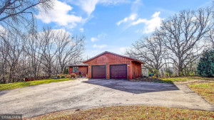 Photo for 2024 Eaglewood Circle, Shakopee, MN 55379 - Listing #6129537 Front of home and view showing large asphalt driveway with extra parking space off to side - great for large RV or vehicles