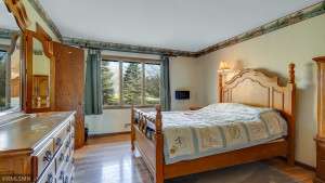 Photo for 2024 Eaglewood Circle, Shakopee, MN 55379 - Listing #6129537 Master bedroom has hardwood floors, great views and access to the main bathroom