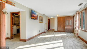 Photo for 2024 Eaglewood Circle, Shakopee, MN 55379 - Listing #6129537 Family room - view to hallway, 3/4 bath and 2 nice sized bedrooms. Walkout door to backyard is to the right