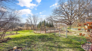Photo for 2024 Eaglewood Circle, Shakopee, MN 55379 - Listing #6129537 View from side of home looking at deck and back yard