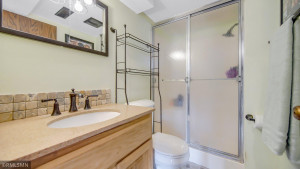 Photo for 2024 Eaglewood Circle, Shakopee, MN 55379 - Listing #6129537 Lower Level 3/4 bath - granite counters, updated tile and in-floor heating