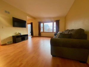Photo for 16755 Mankato Street NE, Ham Lake, MN 55304 - Listing #6124165 Spacious living room offers beautiful views of the wetlands behind the home.