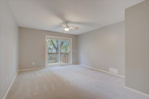 Photo for 5514 E Bavarian Pass, Fridley, MN 55432 - Listing #6117306 The upper level Primary bedroom includes access to a private deck – great place to enjoy your morning coffee!