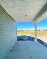 Photo for 19400 Grass Lake Trail, Rogers, MN 55374 - Listing #6128842 Image of actual home - Covered Rear Patio