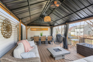 Photo for 410 Lancaster Lane N, Champlin, MN 55316 - Listing #6184032 It's going to warm up soon, promise! Your deck features a large pergola, lots of room to spread out! Note the screens that can shield you from those summer bugs.