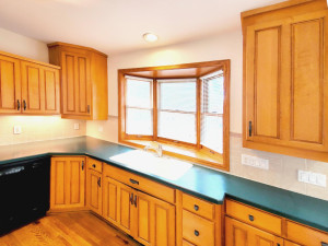 Photo for 1611 Merrill Street, Saint Paul, MN 55108 - Listing #6199995 Designed for beauty and function, the sink has a beautiful bay window that spreads light magically. A custom, angled base cabinet ensures easy access to oversized storage. The angled upper also offers spectacular storage not found in most uppers.