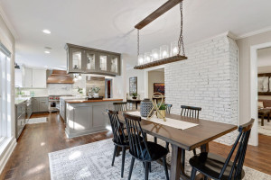 Photo for 3530 Edmund Boulevard, Minneapolis, MN 55406 - Listing #6205579 Joining the kitchen with the dining room is a serving counter with a wine fridge. The open flow and the gracious floorplan of this home creates an inviting environment for entertaining!