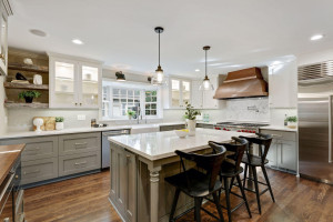 Photo for 3530 Edmund Boulevard, Minneapolis, MN 55406 - Listing #6205579 The center island boasts overhead pendant lighting and counter seating for meals-on-the-go.