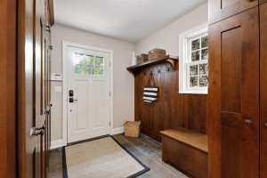 Photo for 3530 Edmund Boulevard, Minneapolis, MN 55406 - Listing #6205579 The mudroom offers two walls of closets and cabinets, plus a bench and tile floors.