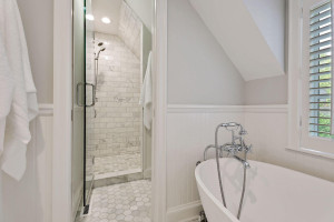 Photo for 3530 Edmund Boulevard, Minneapolis, MN 55406 - Listing #6205579 Find a deep soaking tub, a separate tiled shower with dual shower heads, and an expansive vanity with double sinks and loads of storage.