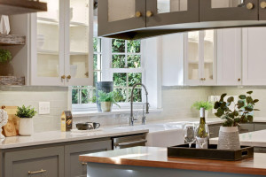 Photo for 3530 Edmund Boulevard, Minneapolis, MN 55406 - Listing #6205579 A bay window over the farmhouse sink provides plenty of sunlight. Find a reverse osmosis water system, and the glass-front cabinets are an ideal place to store and display your fine glassware and dishes.