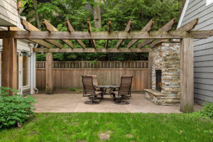 Photo for 3530 Edmund Boulevard, Minneapolis, MN 55406 - Listing #6205579 The back patio with pergola and brick fireplace will expand your entertainment space! Enjoy roasting marshmallows in the gas fireplace, or chat with you company under the stars.