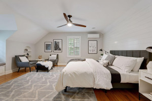 Photo for 3530 Edmund Boulevard, Minneapolis, MN 55406 - Listing #6205579 Escape to the upper level to find the private owner’s suite! Note the plantation shutters and shiplap wall.