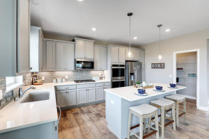 Photo for 12391 62nd Street NE, Otsego, MN 55301 - Listing #6195953 Not only does the kitchen feature an abundance of counter space and a massive island, it also is home to a 10ft deep walk-in pantry! *pictures are of model, actual colors in home may vary.