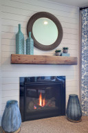 Photo for 12391 62nd Street NE, Otsego, MN 55301 - Listing #6195953 Gas fireplace with rustic mantle and full height shiplap surround provide a visual beauty to accent the family room. *pictures are of model home, actual colors may vary.
