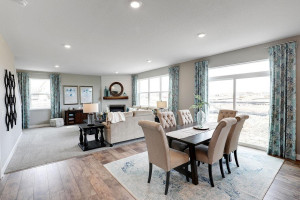 Photo for 12391 62nd Street NE, Otsego, MN 55301 - Listing #6195953 The main level seamlessly transitions from room to room while maintaining an open-concept layout throughout. *pictures are of model home, actual colors may vary.