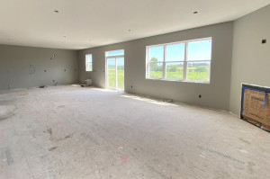 Photo for 12391 62nd Street NE, Otsego, MN 55301 - Listing #6195953 Excuse the mess! Home under construction. Picture is of actual home. View of the main level from family room towards kitchen.