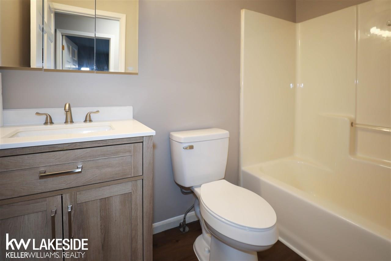 794 Cove Rd, Wales, MI — Photo 16