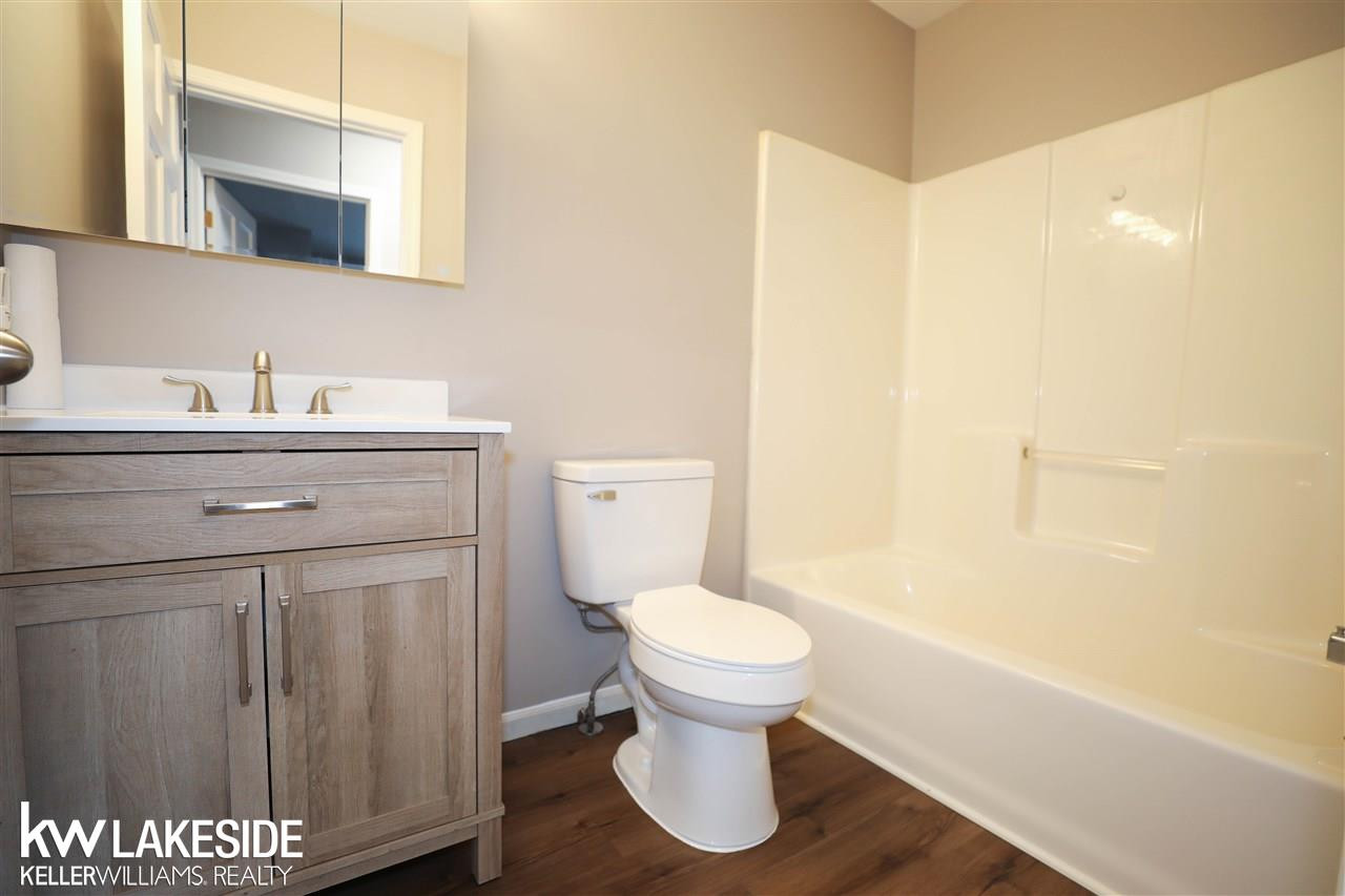 794 Cove Rd, Wales, MI — Photo 17