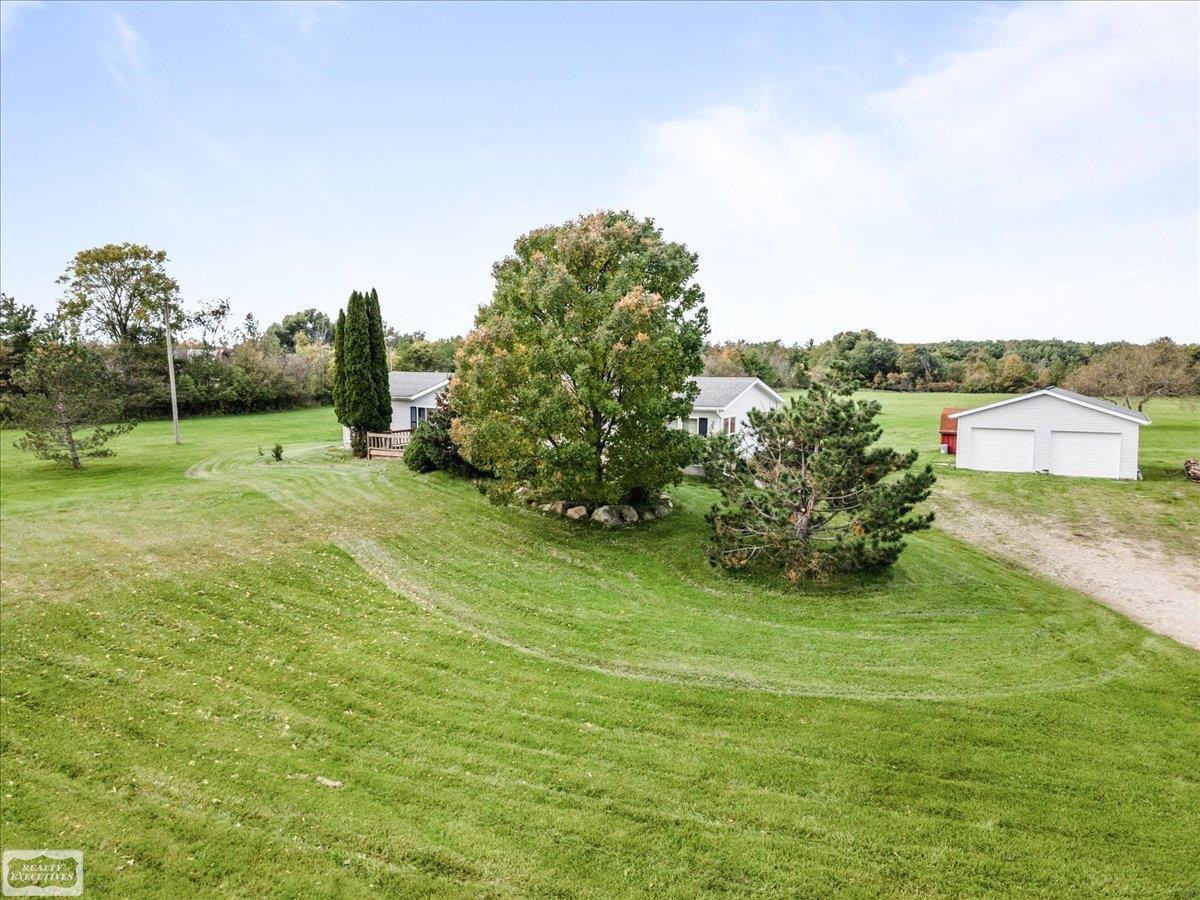 8143 Gibbons Road, Grant, MI 48032 — Photo 31