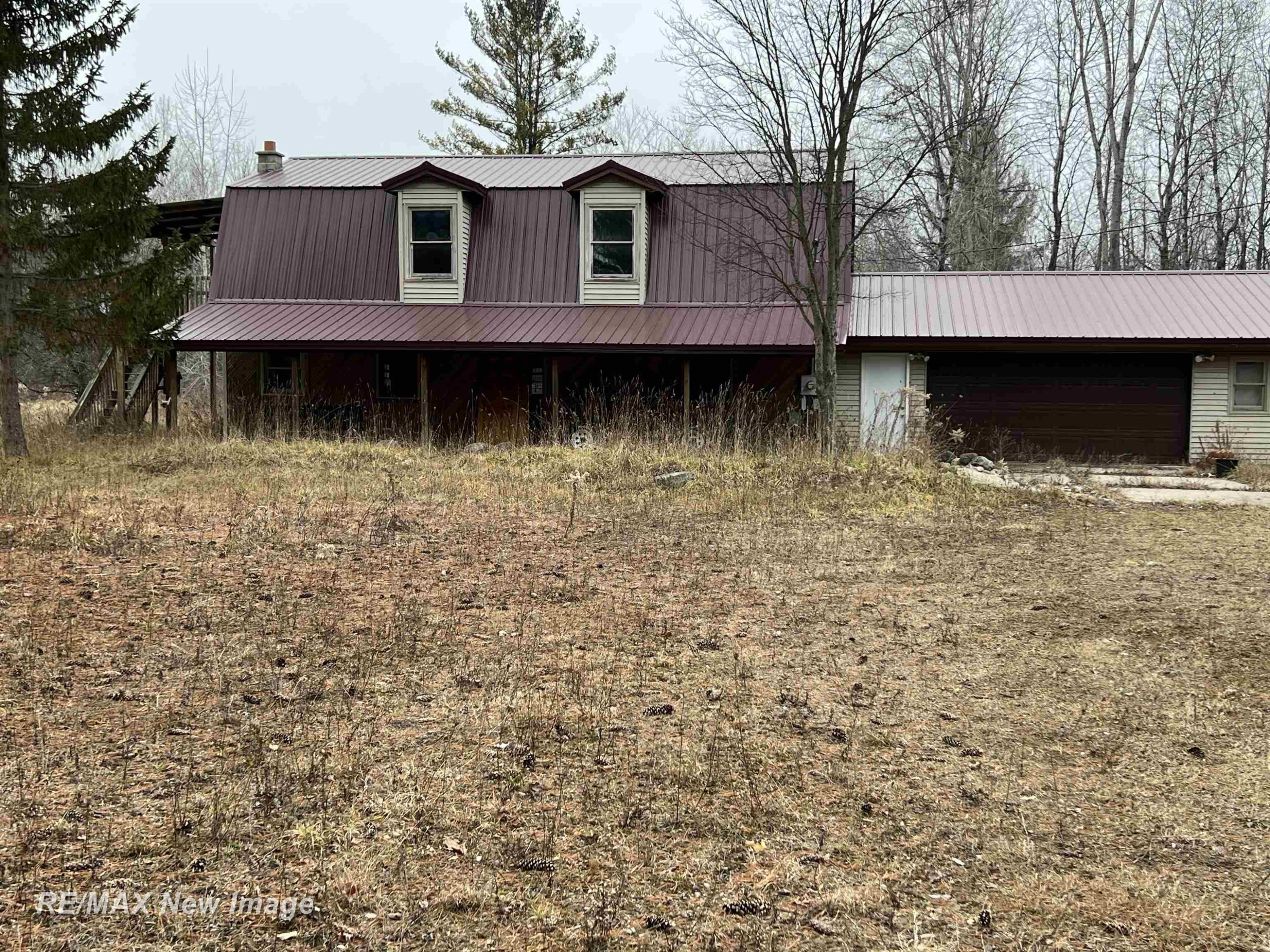 3346 Long Road, Beaverton, MI 48612 — front exterior