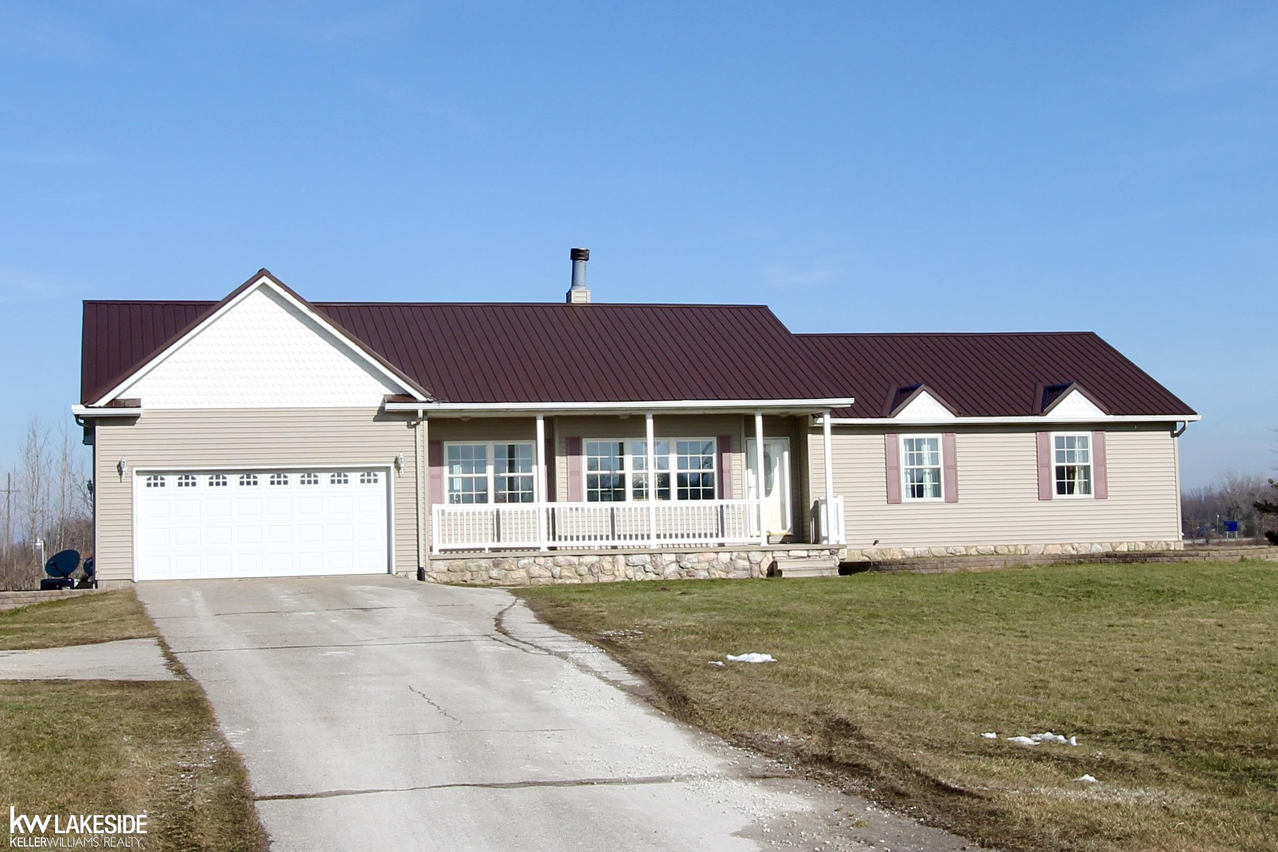 13484 Burt Road, Emmett, MI 48022 — front exterior