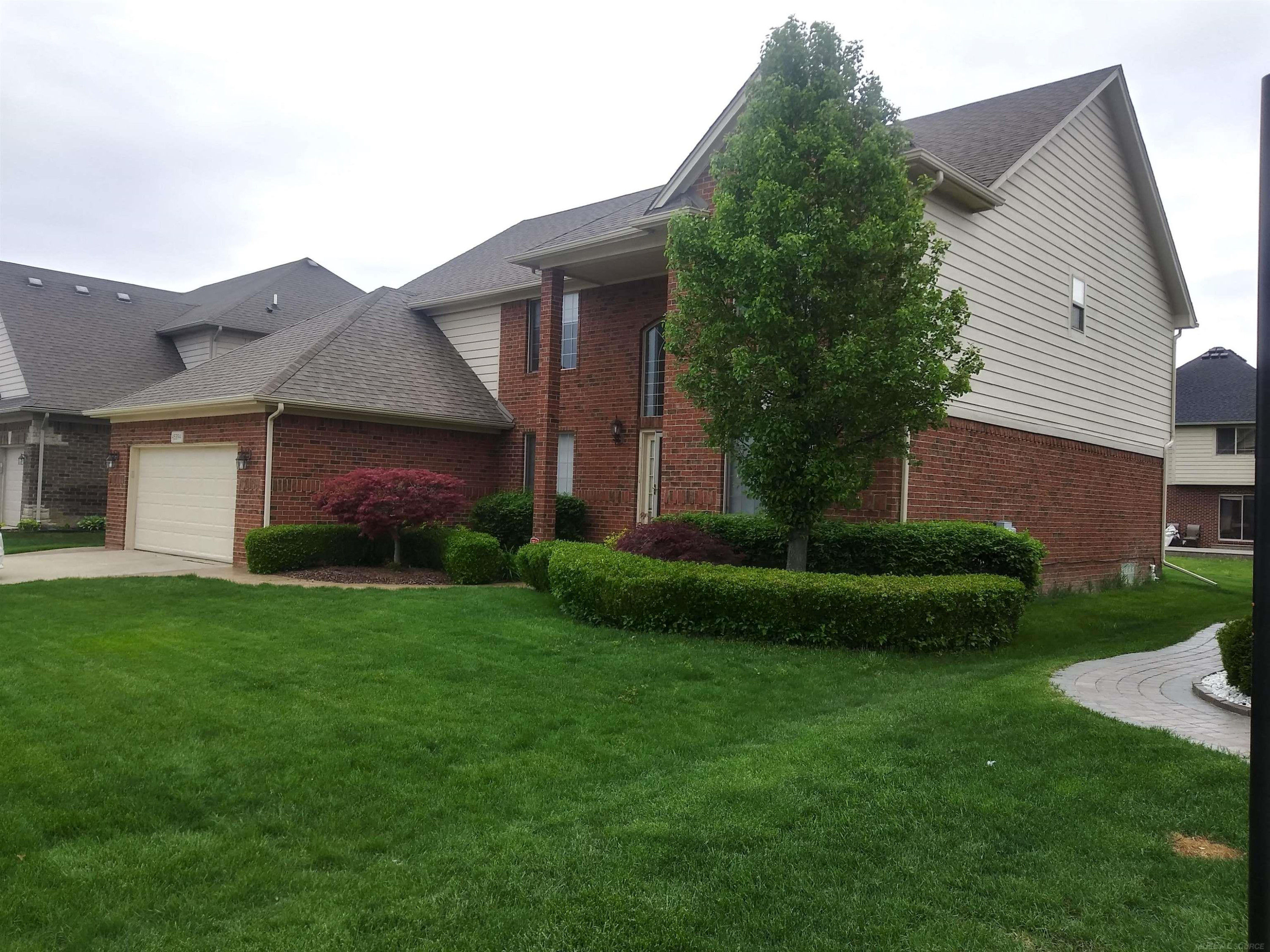 45394 Torch Lake Drive, Macomb, MI 48044 — front exterior