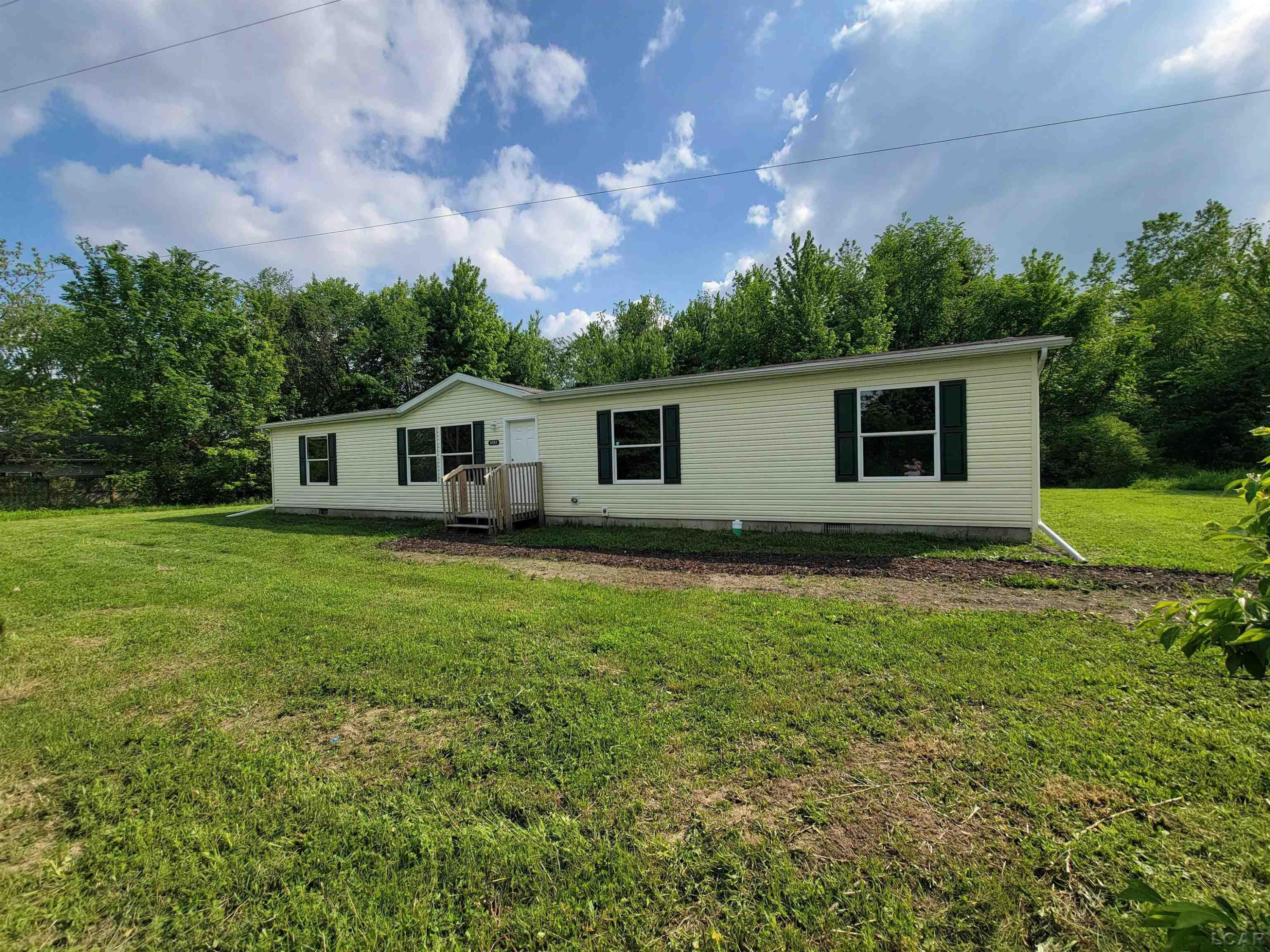 8583 E Monroe Road, Britton, MI 49229 — front exterior
