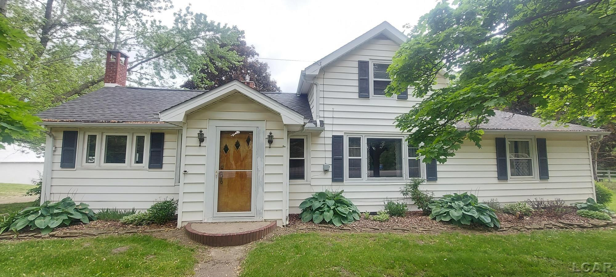 6328 RIDGE, Britton, MI 49229 — front exterior