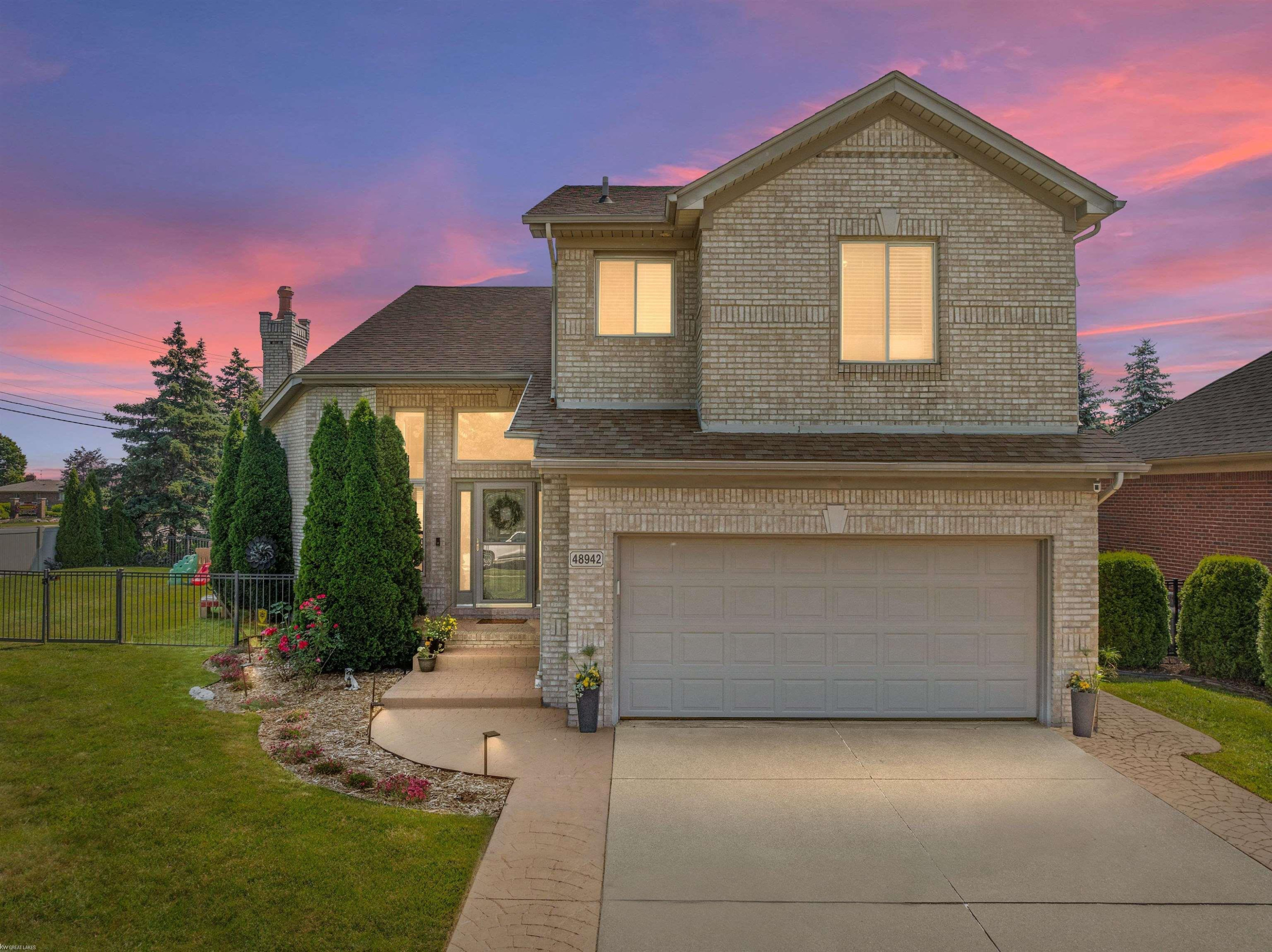 48942 Jefferson Drive, Macomb, MI 48044 — front exterior