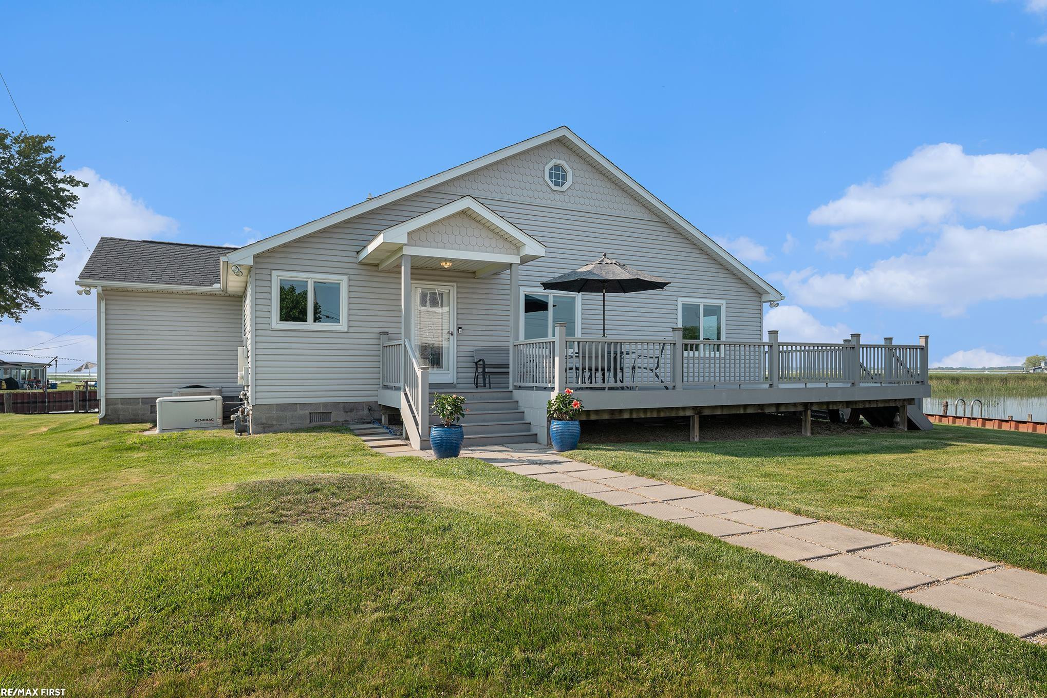 7610 South Channel Drive, MI 48028 — Photo 2