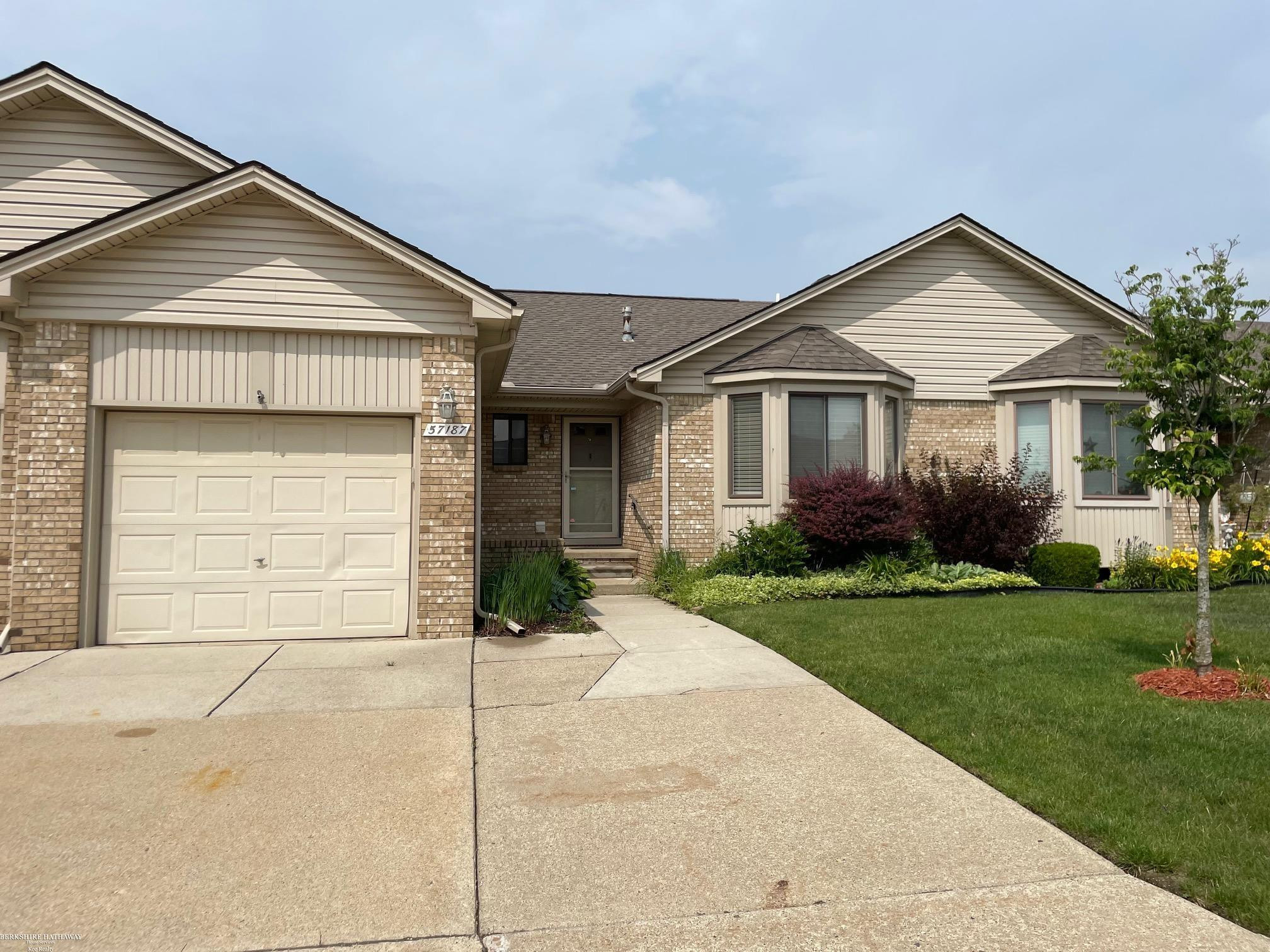57187 Sycamore Drive, MI — front exterior