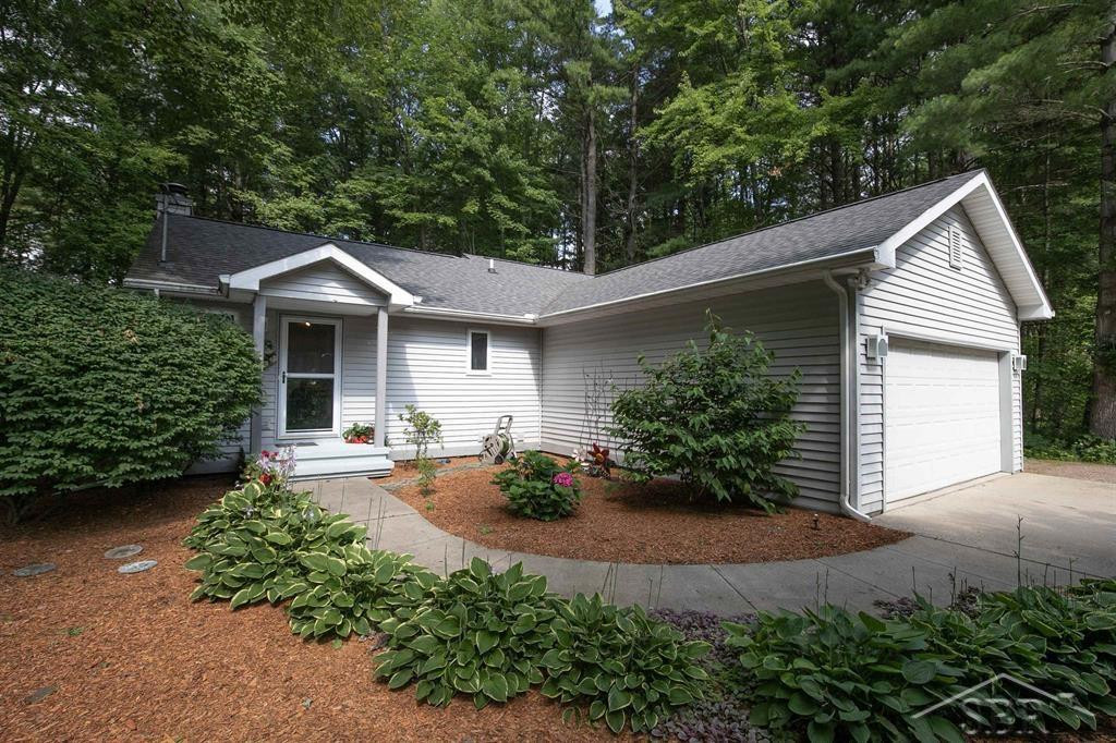 2313 N Meridian Road, Sanford, MI 48657 — front exterior