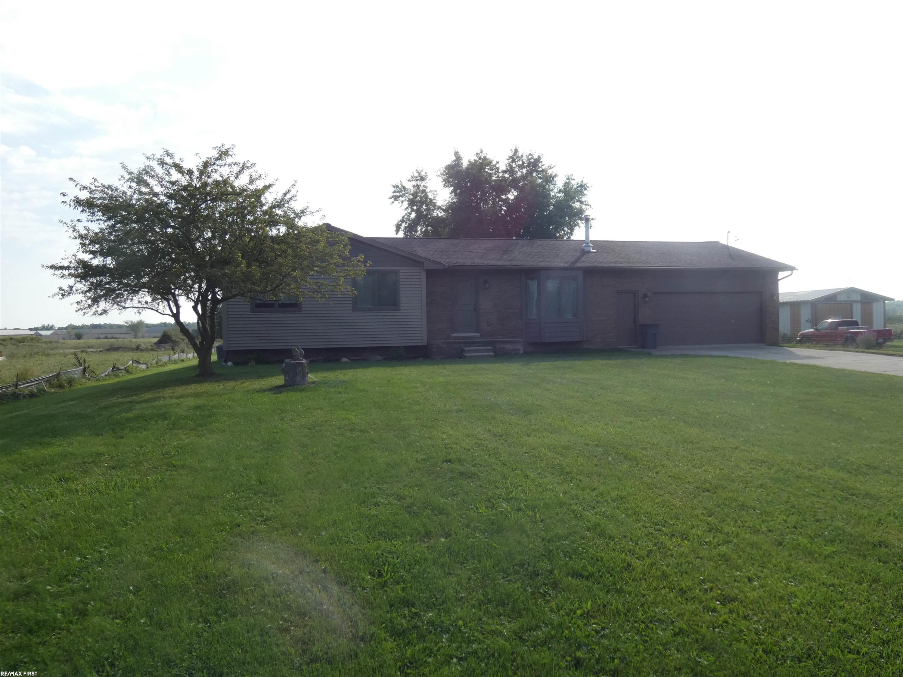 60415 Indian Trail Trail, MI — front exterior