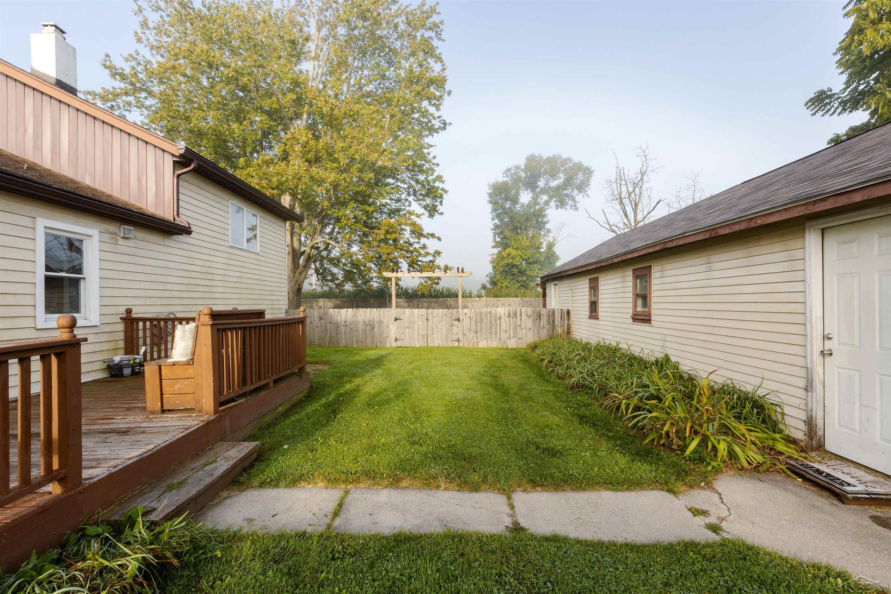 815 N Coleman Road, Coleman, MI 48618 — front exterior