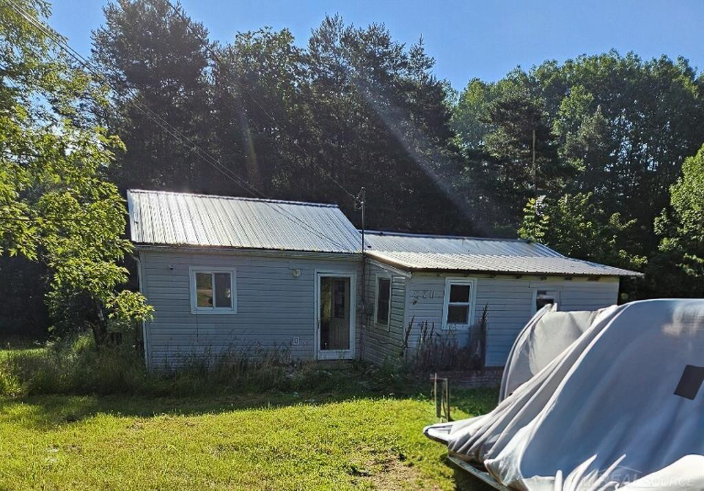 5200 Half Moon Trail, Lake, MI 48632 — front exterior