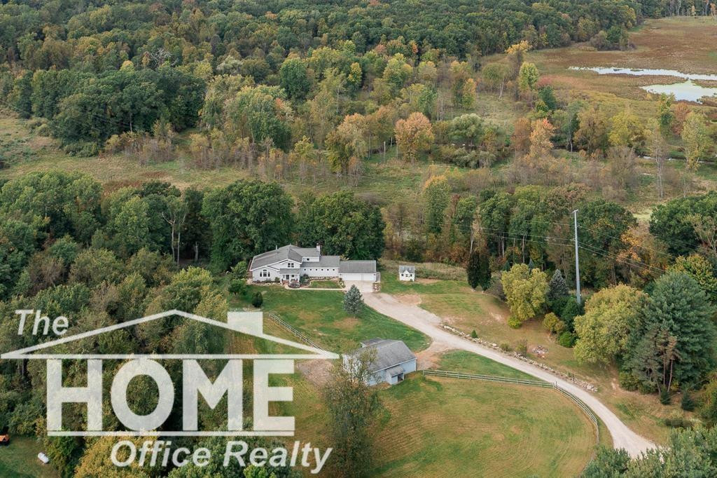 8525 Jonera, Howell, MI 48855 — front exterior