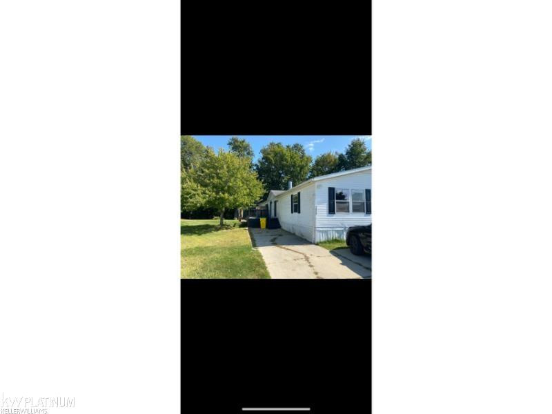 52239 Landsdowne Circle, Chesterfield, MI — front exterior