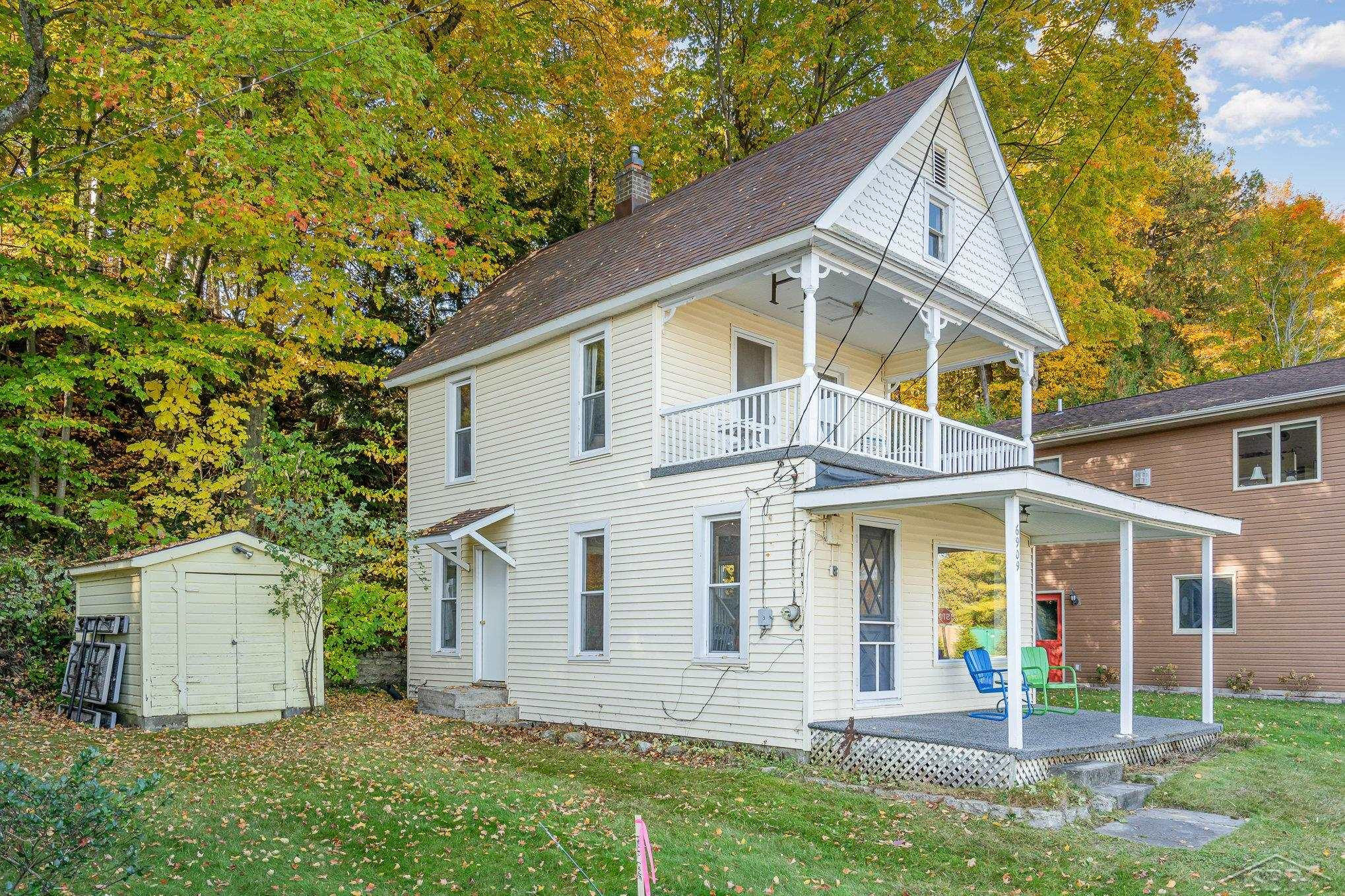 6909 Crystal Avenue, Beulah, MI 49617 — front exterior